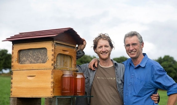 Cedar and Stuart Anderson Next to a Flow Hive