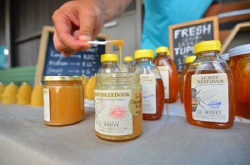 Honey Being Sold at a Farmers Market