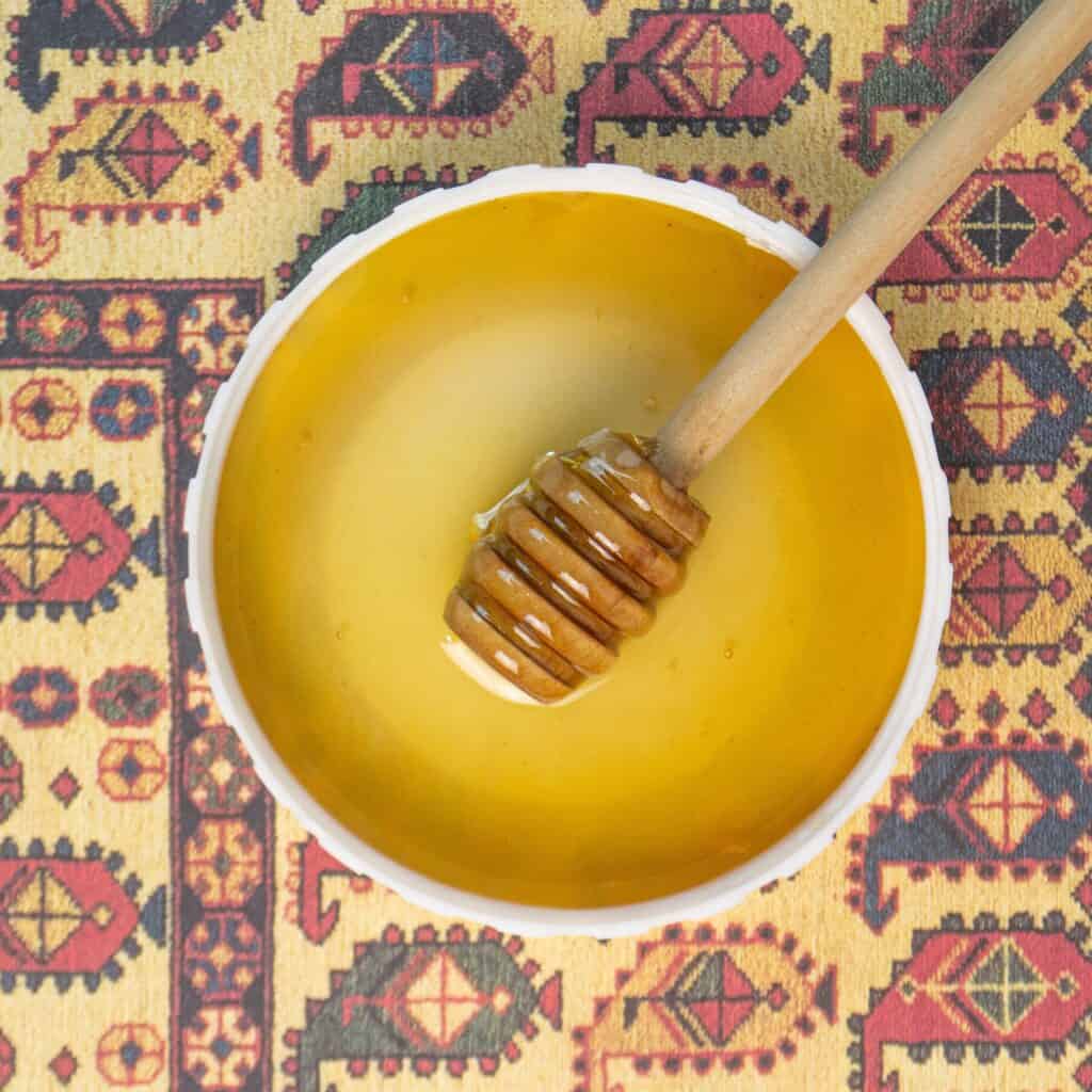 One of raw honey's health benefits is its nutritional value in boosting energy