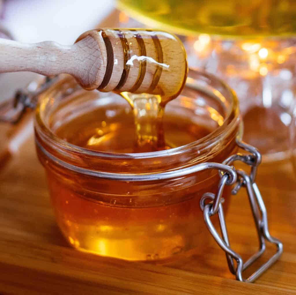 Glass base honey dispenser