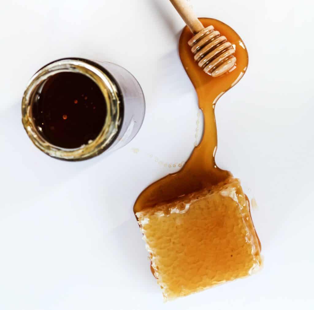 Raw honey is of a darker shade if produced from the nectars of flowering plants that have dark plants blossom